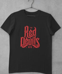 mockup of a basic tee hanging on a concrete wall 33689 15